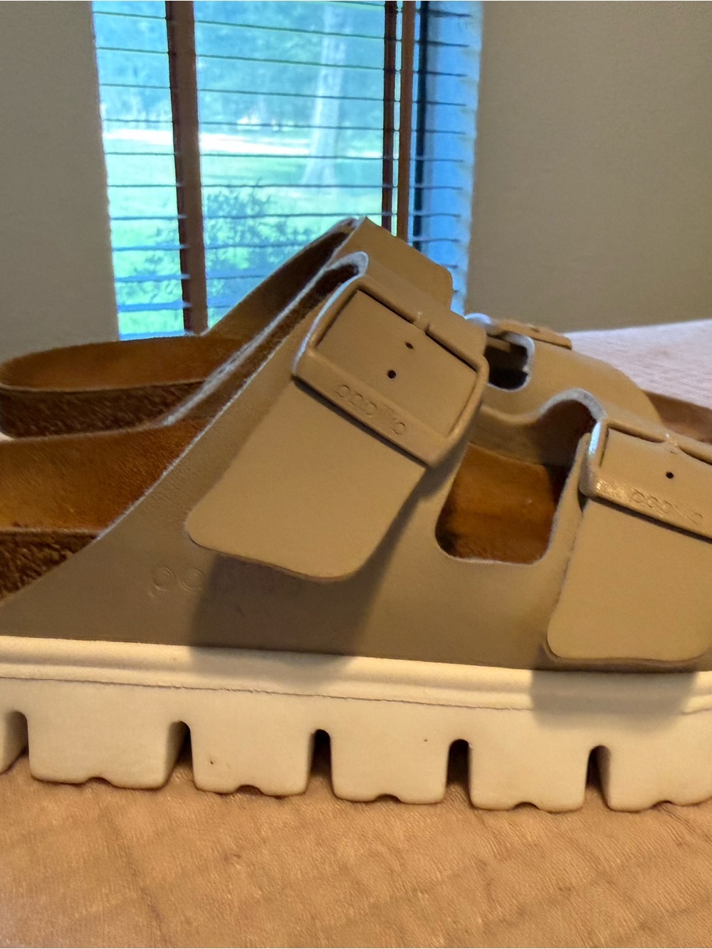 Birkenstock  Two-Strap Buckle Sandal in Beige and White